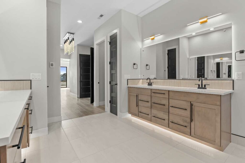 custom home design primary bathroom by Prodigy Homes