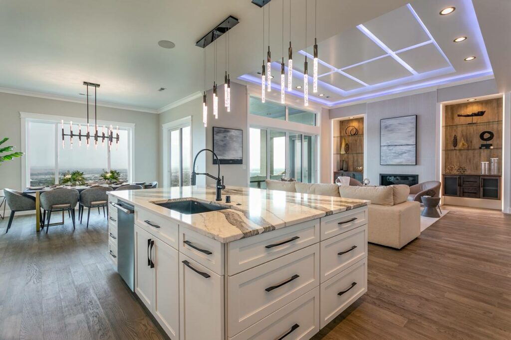 an elegant and luxury kitchen, dining and living area by Prodigy Homes Parade of Homes Tri-Cities